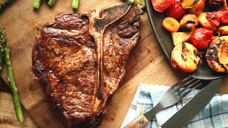 T-bone steak on cutting board