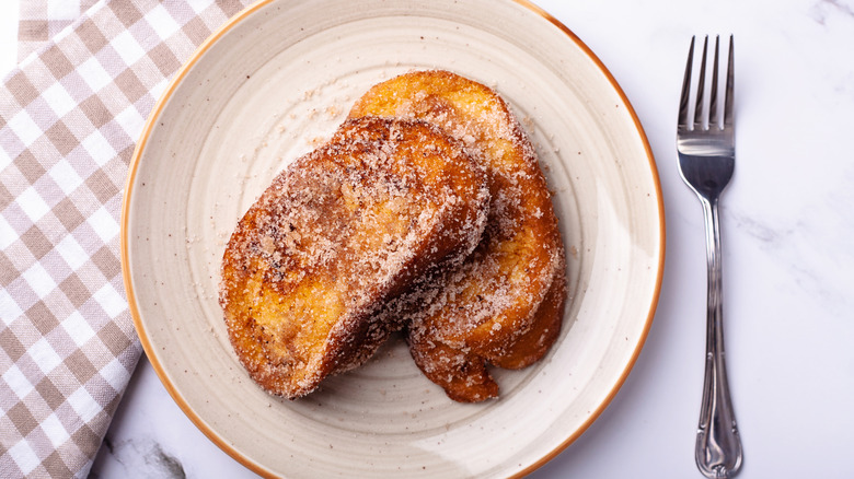 French toast with cinnamon sugar on a plate