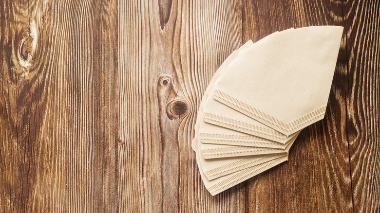 unbleached coffee filters on wood