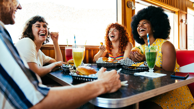 group eating lunch at fast food restaurant