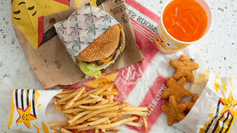 Carl's Jr. burger, fries, chicken stars, and drink