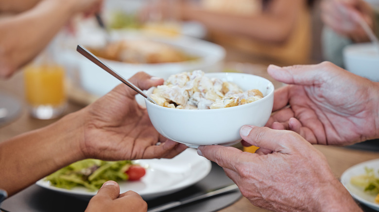 Potato salad passed around dinner table