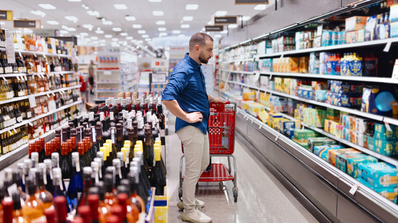 Man shopping for alcohol at Target