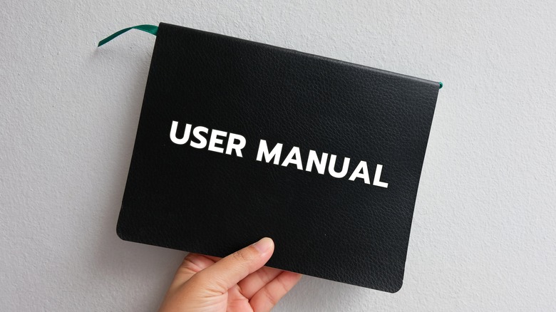 Black pouch labeled "User Manual"