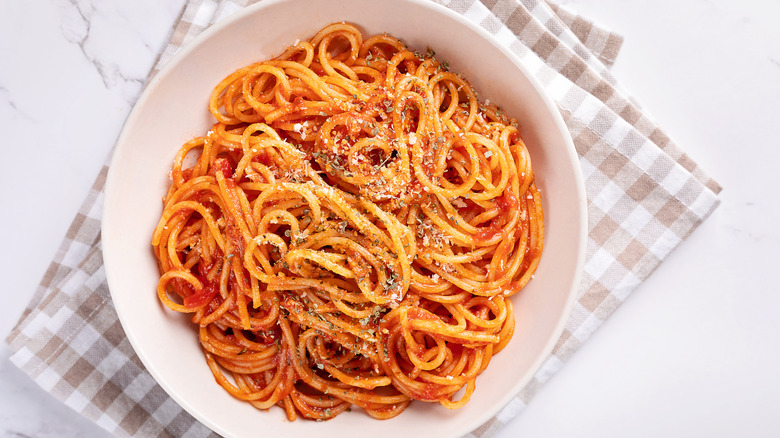 Spaghetti with tomato sauce on plate