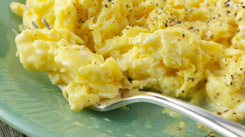 Creamy scrambled eggs on a plate