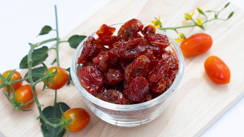 Small glass jar filled with candied tomatoes