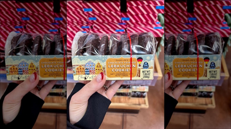 Woman holding pack of cookies