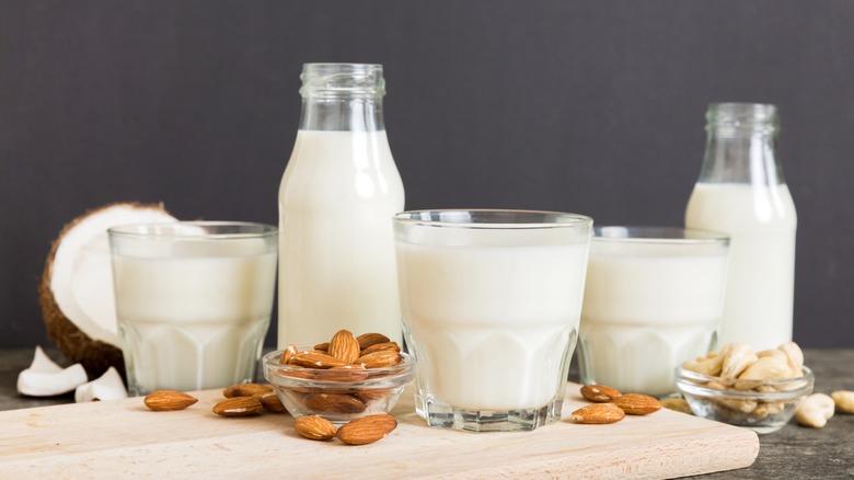 assorted vegan milks on table