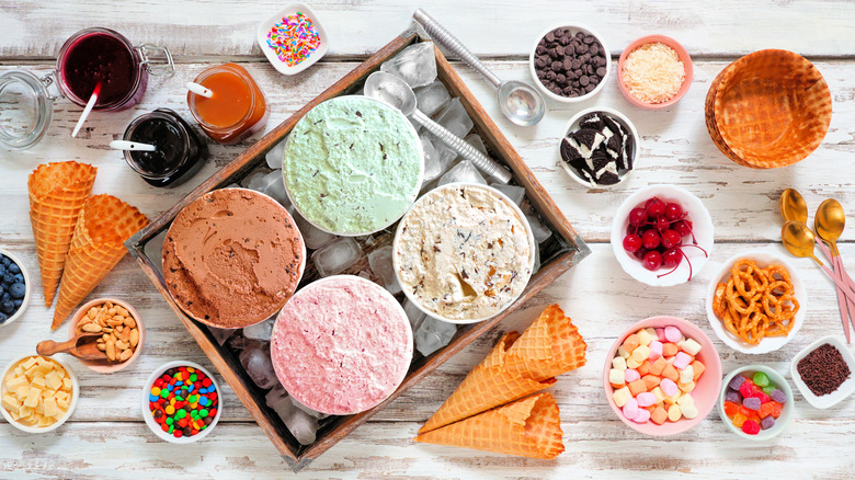 colorful ice cream with candy, snacks, and cones