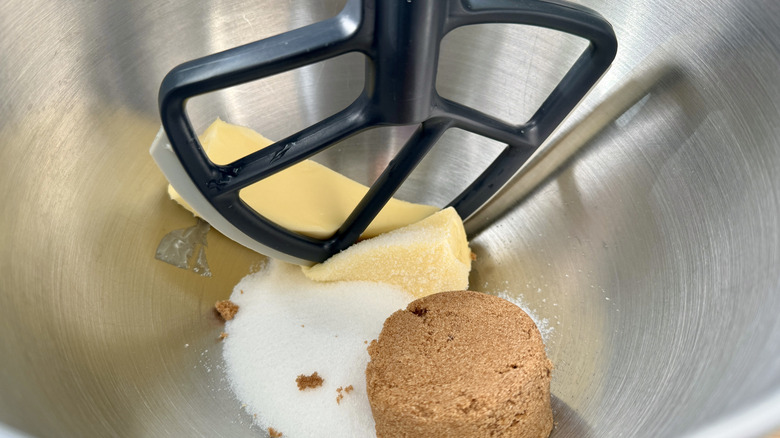 Butter and sugars in mixing bowl