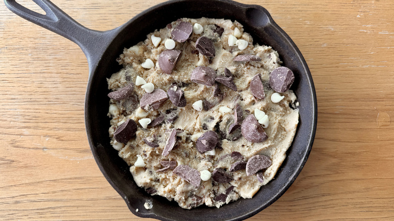 Unbaked Pizookie topped with chocolate