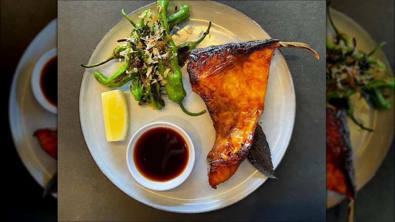 Grilled collar with dipping sauce.