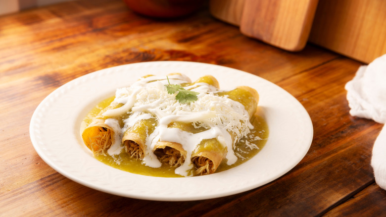 Green enchiladas on a plate