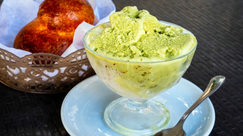 Green shaved ice dessert with bread