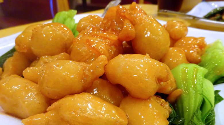 orange chicken served with bok choy