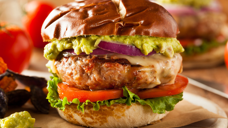 A turkey burger with toppings