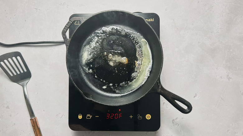 heating butter in a cast iron skillet