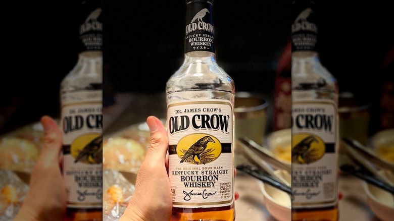 A bottle of Old Crow bourbon features a crow on the label.