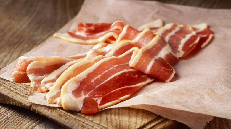 Uncooked Bacon on Parchment 