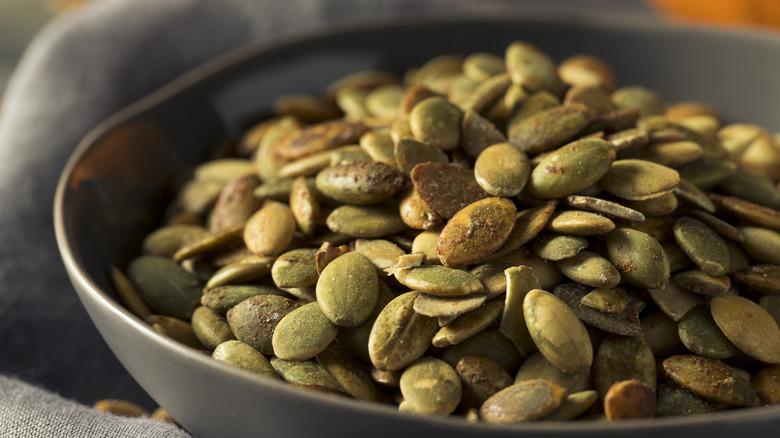 Roasted pumpkin seeds in a bowl