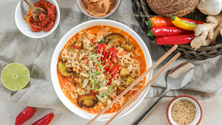 Overhead shot of noodle bowl and spices