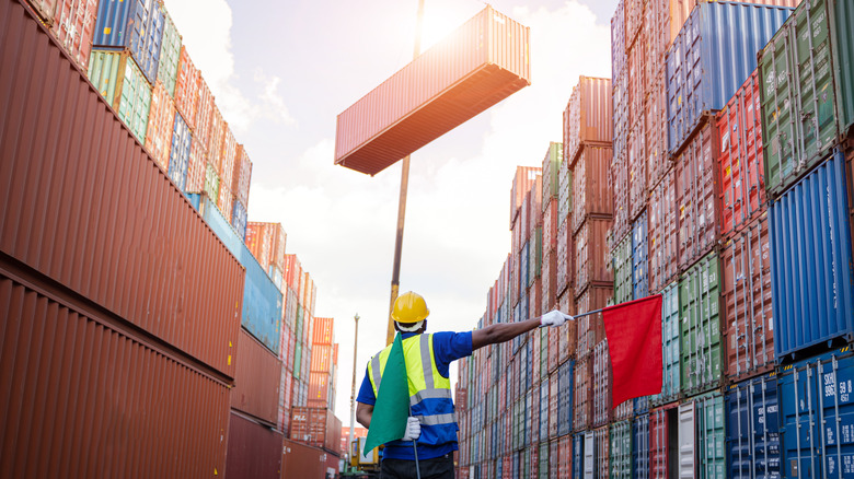 Shipping containers being moved