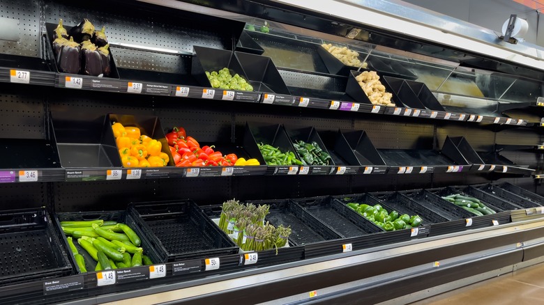 Emptied produce section in store