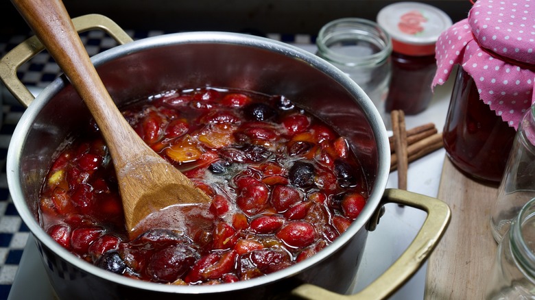 Fruit cooking in a pot to make homemade jam