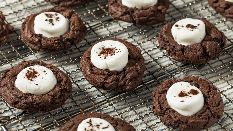 Hot cocoa cookies on a cooling rack