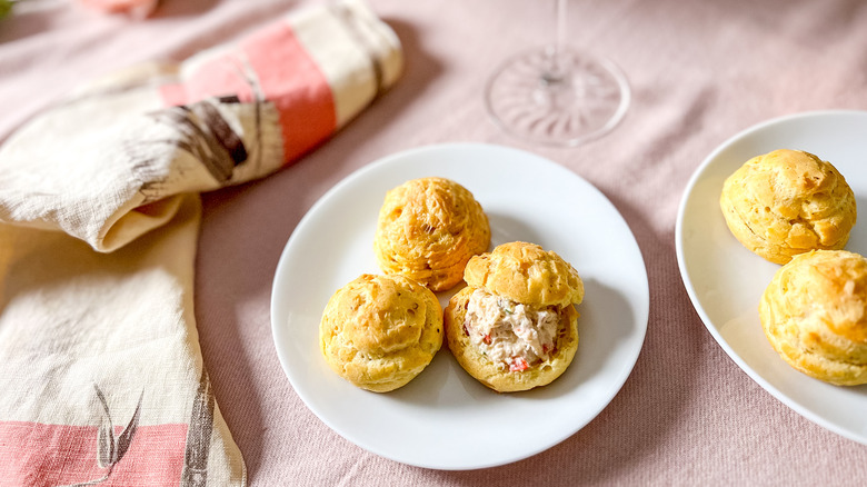 Valentine's Day gruyere and crab gougères on plates