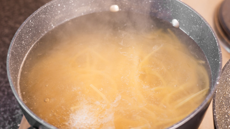 pasta cooking in pot 