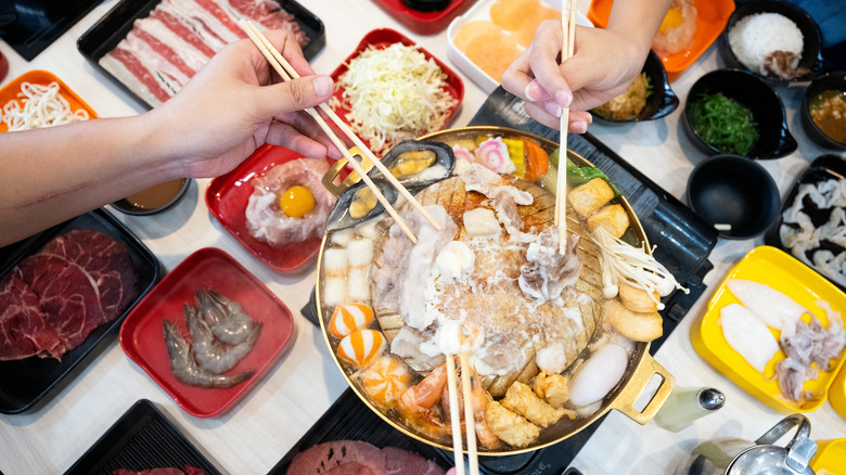 shabu shabu hotpot with various ingredients