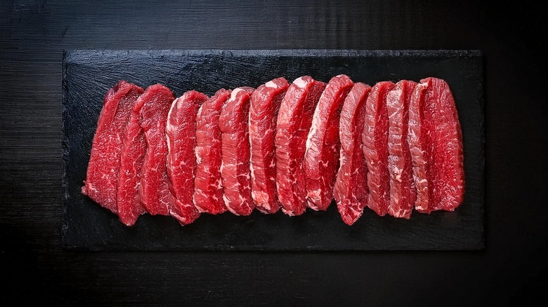 Wagyu beef slices on black