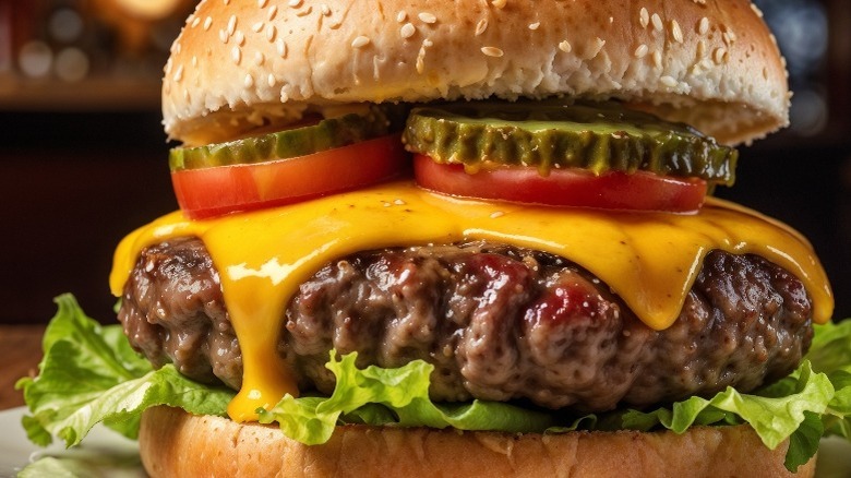 close-up of a cheeseburger with melty American cheese