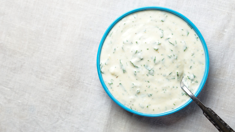 Homemade ranch dressing in blue dish