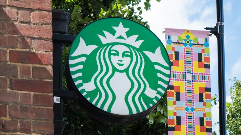 An exterior Starbucks logo sign