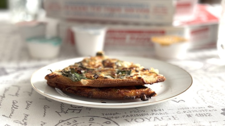 Domino's gluten-free pizza crusts stacked two deep