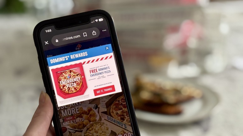 Domino's rewards coupon displayed on iPhone