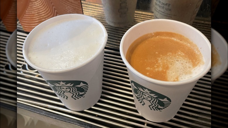 Two Starbucks cortados espresso machine