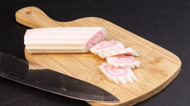 chopped narutomaki on cutting board