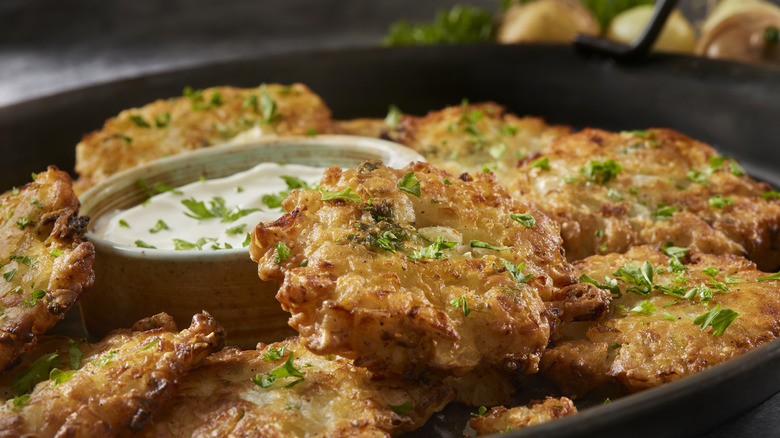 potato latkes in black pan