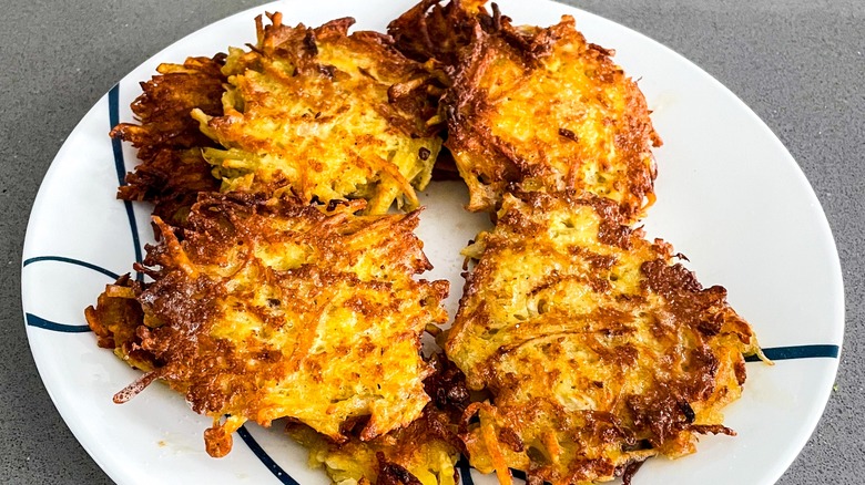 crispy golden latkes on plate