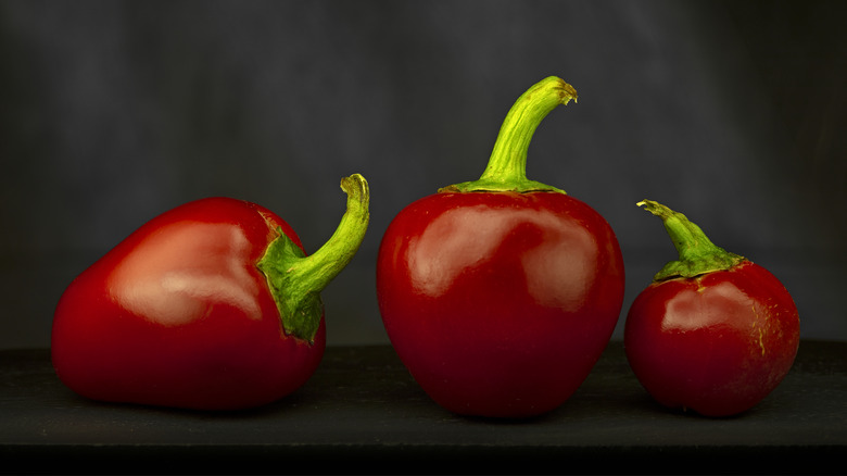 three red pimento peppers