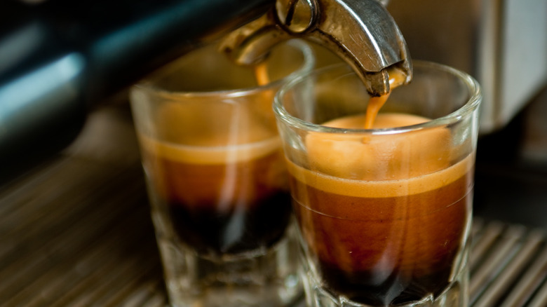 Pouring two espresso shots