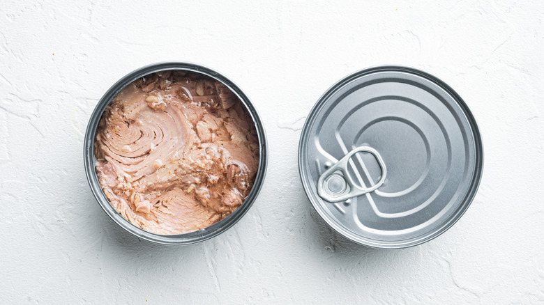 open and closed cans of tuna