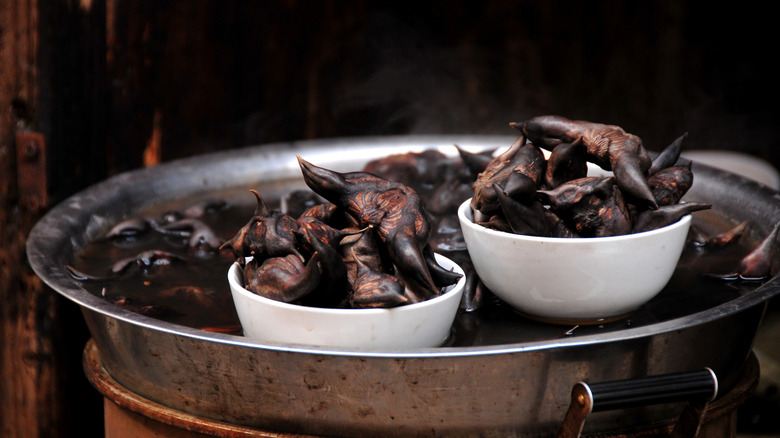 Piles of boiled caltrops in bowls