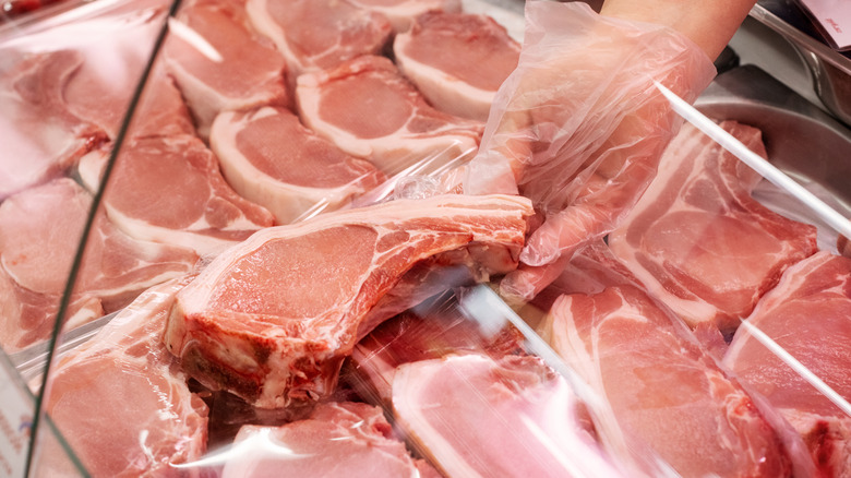 Pork chops at a meat counter