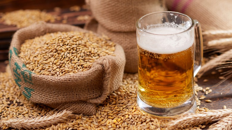 Beer glass and sack of barley