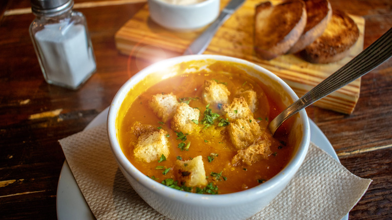 A bowl of tomato soup at restaurant